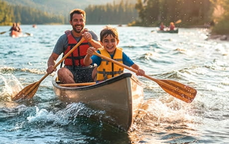 father and son on a boat