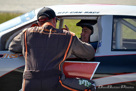 Ride-Along: 8 Laps as the passenger to a professional race car driver for 1 person